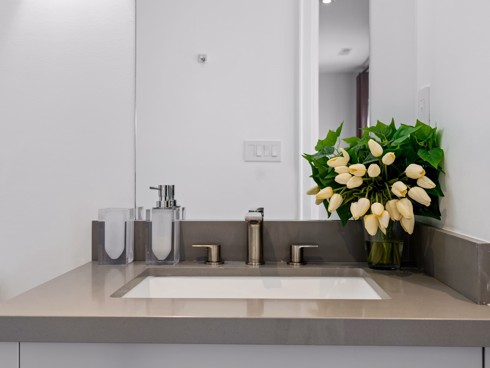 Bathroom mirror detail with tulips