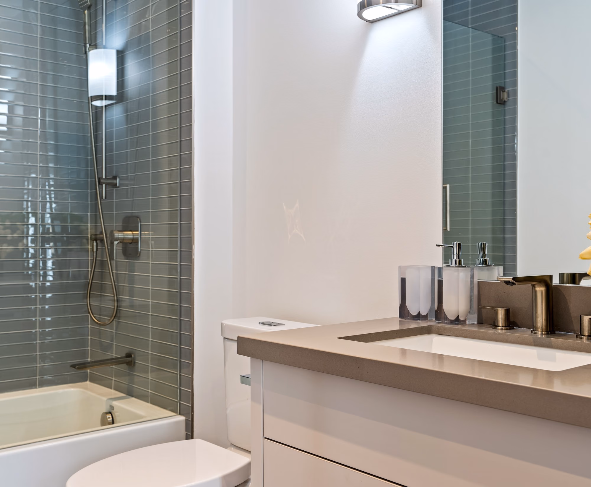 Bathroom vanity with tulips and wall sconce
