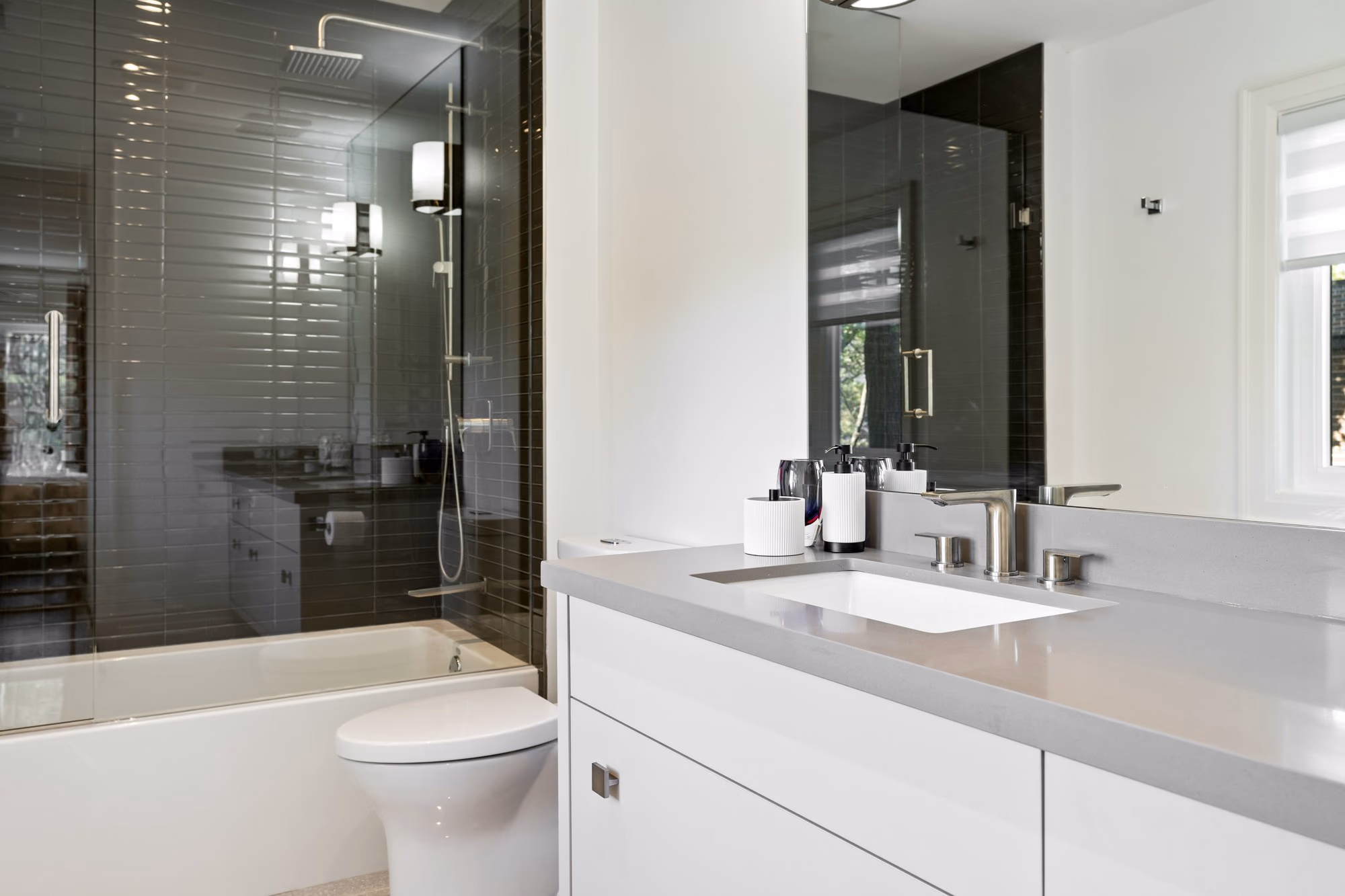 Bathroom with glass shower and floating vanity