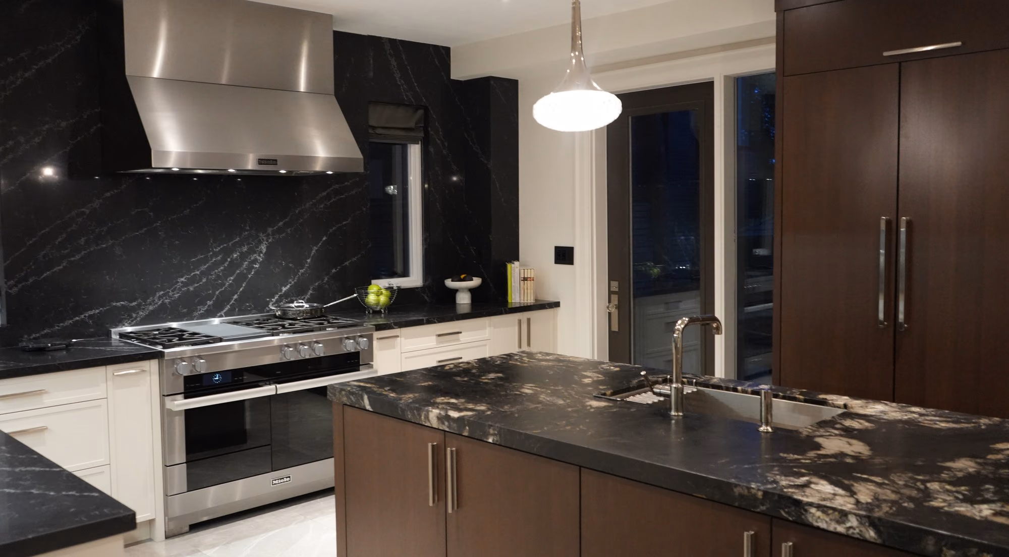 Black marble kitchen island with hood