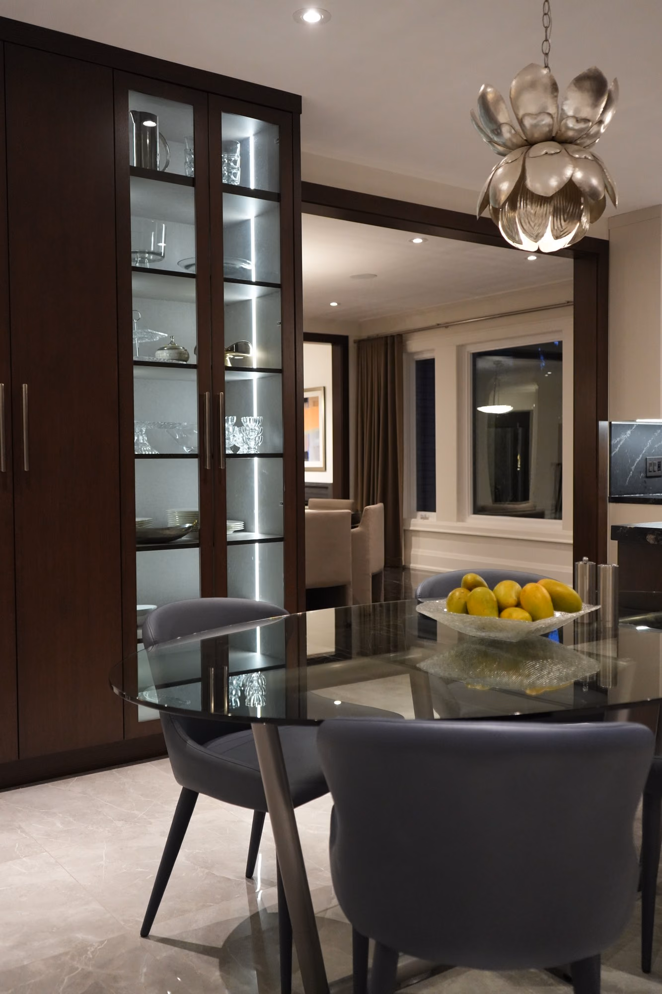 Dark display cabinet with lotus pendant