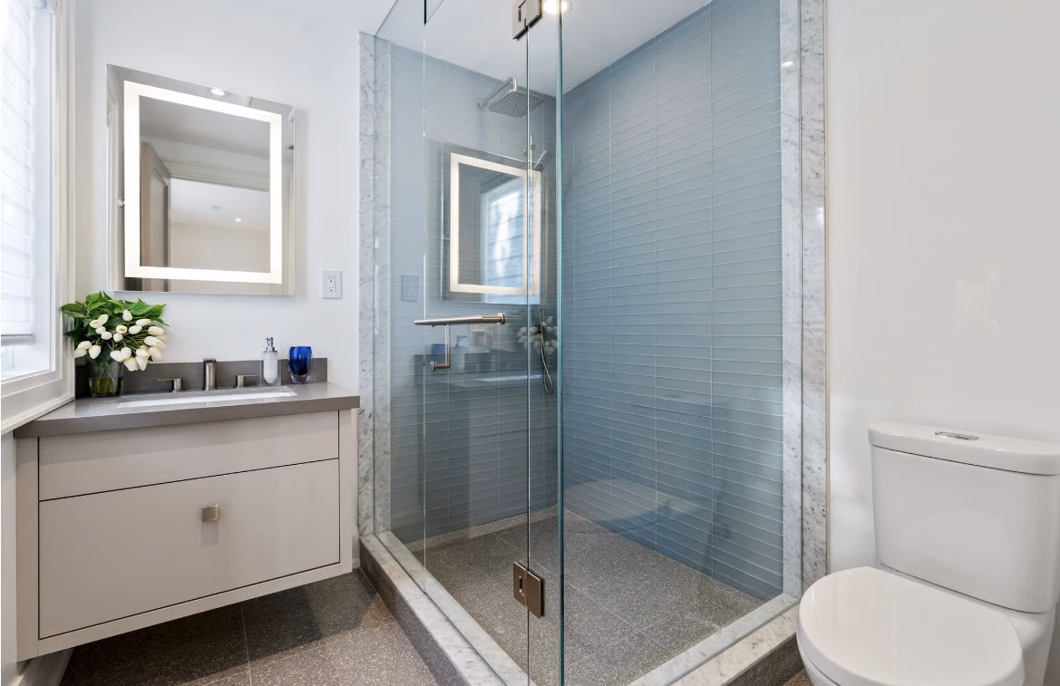 Bathroom with glass shower and floating vanity