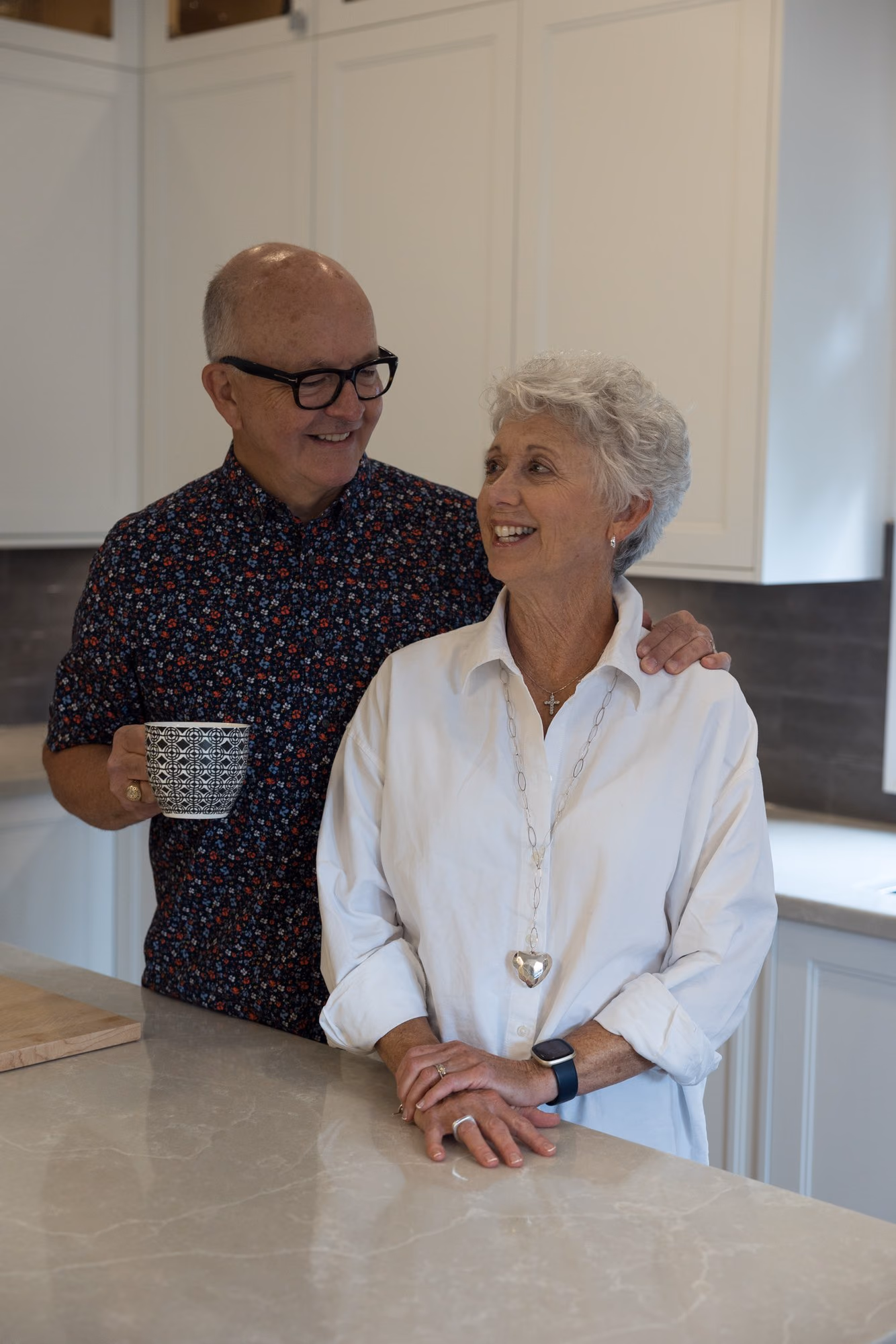 Couple sharing coffee in the farmhouse kitchen